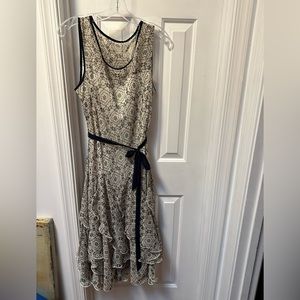 Dress barn ruffle dress. Floral print, navy seam